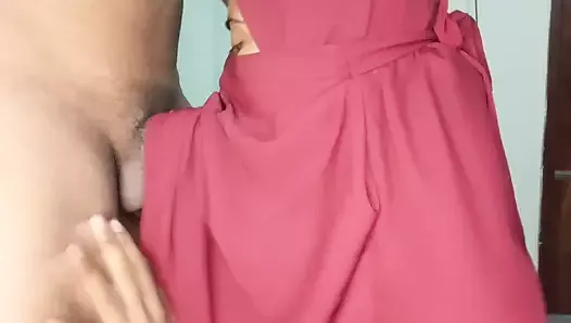 Teacher with Bangladeshi madrasah hijabi student